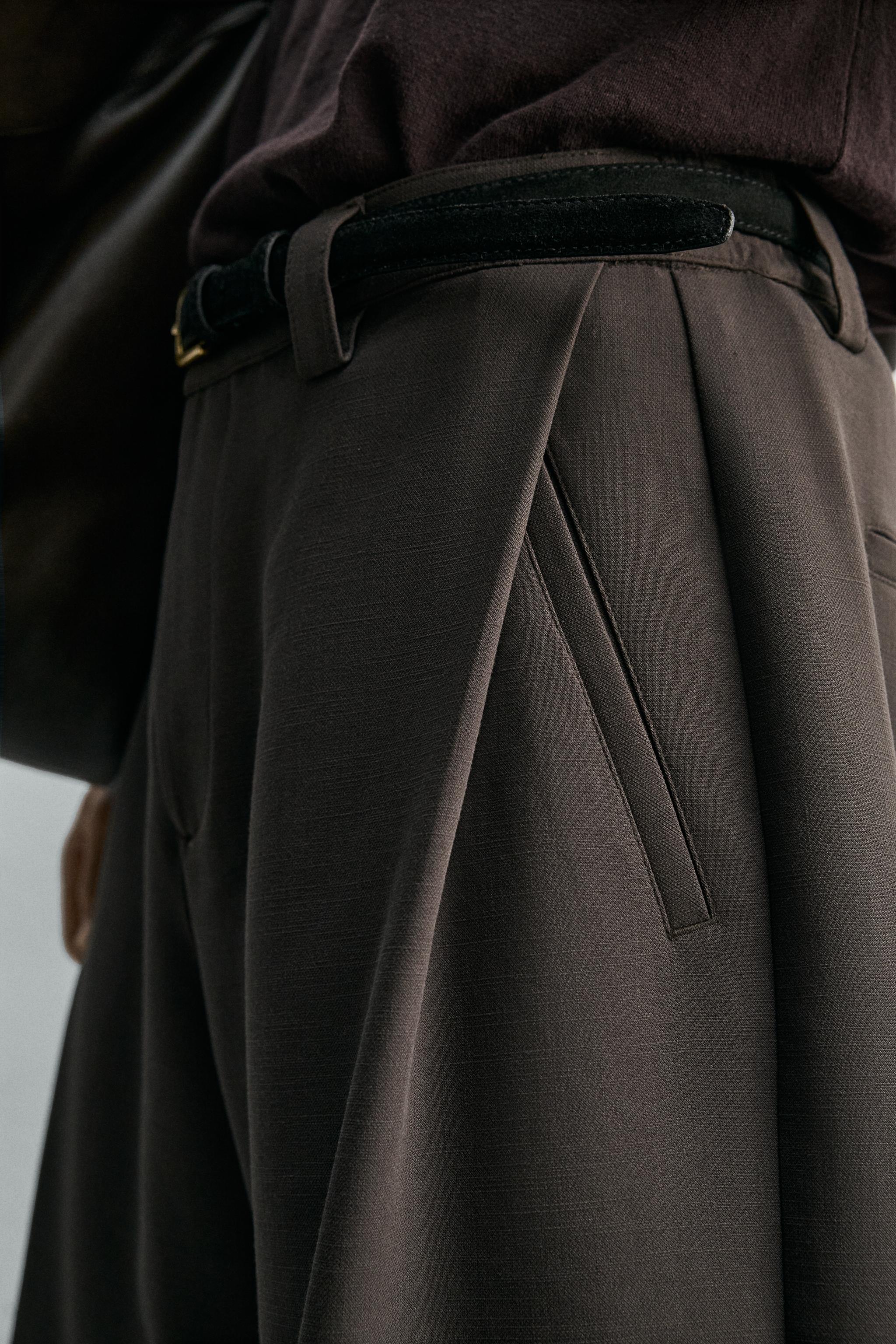 BERMUDA RELAXED FIT PLIS LATÉRAUX